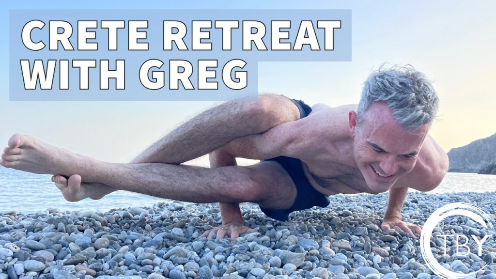 Greg does a fun arm balance on the beach in Sougia